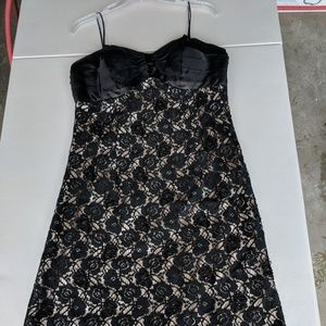 Black lace dress with bow detail on chest